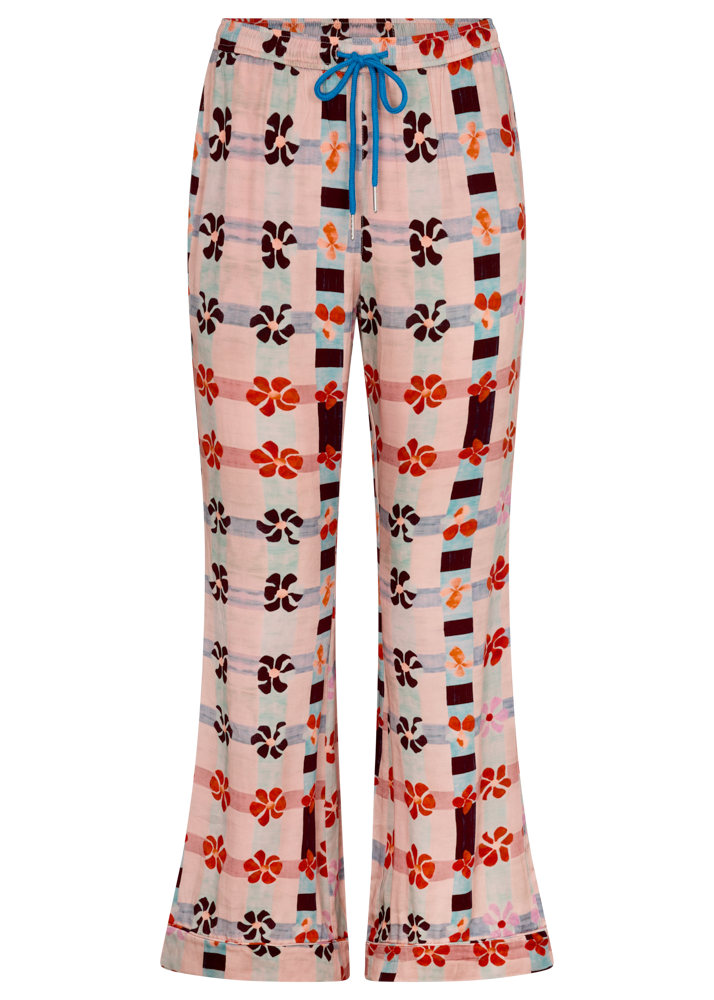 Pink patterned flare pants with a drawstring on a white background