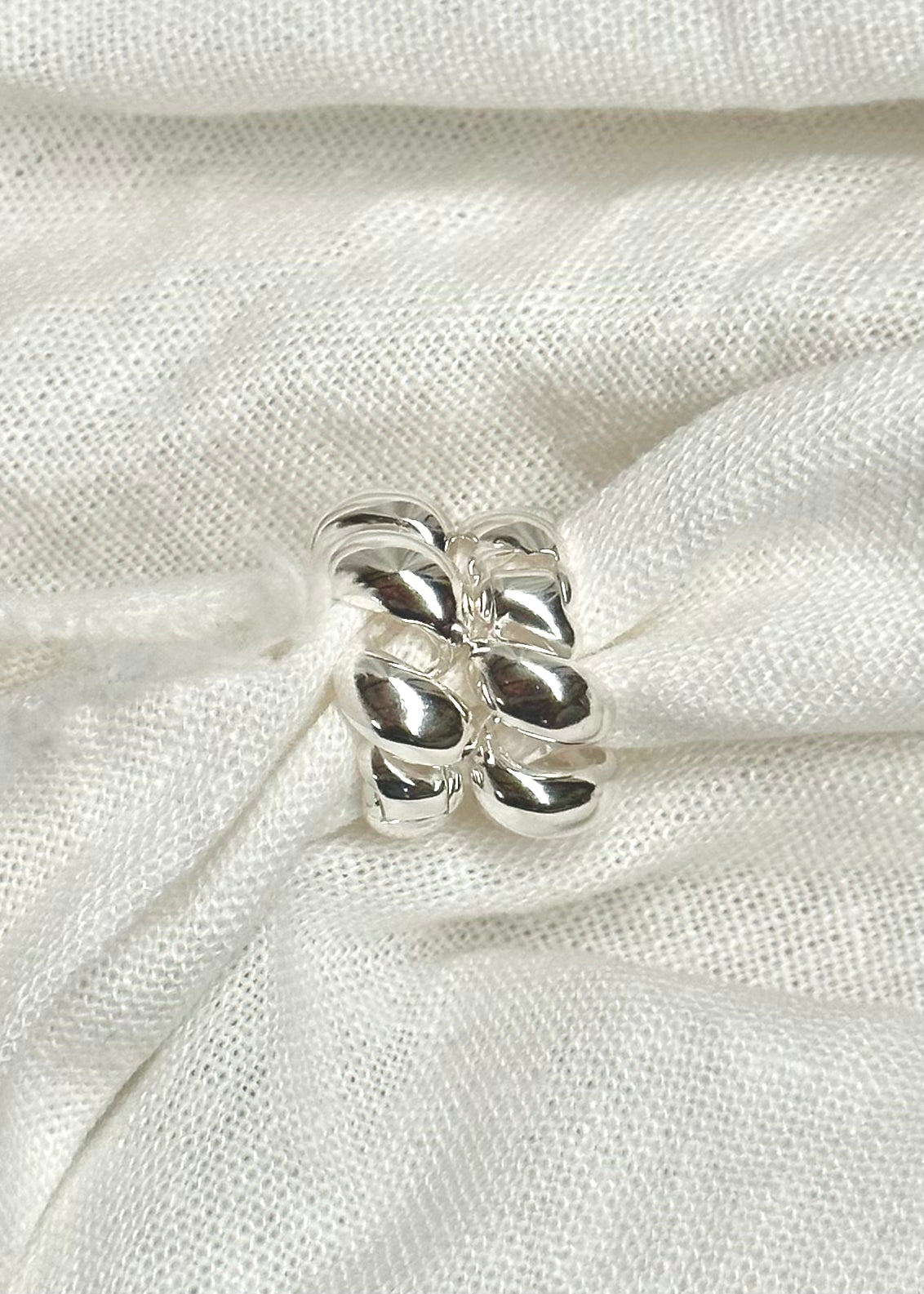 RAIN TWISTED SILVER HOOP
