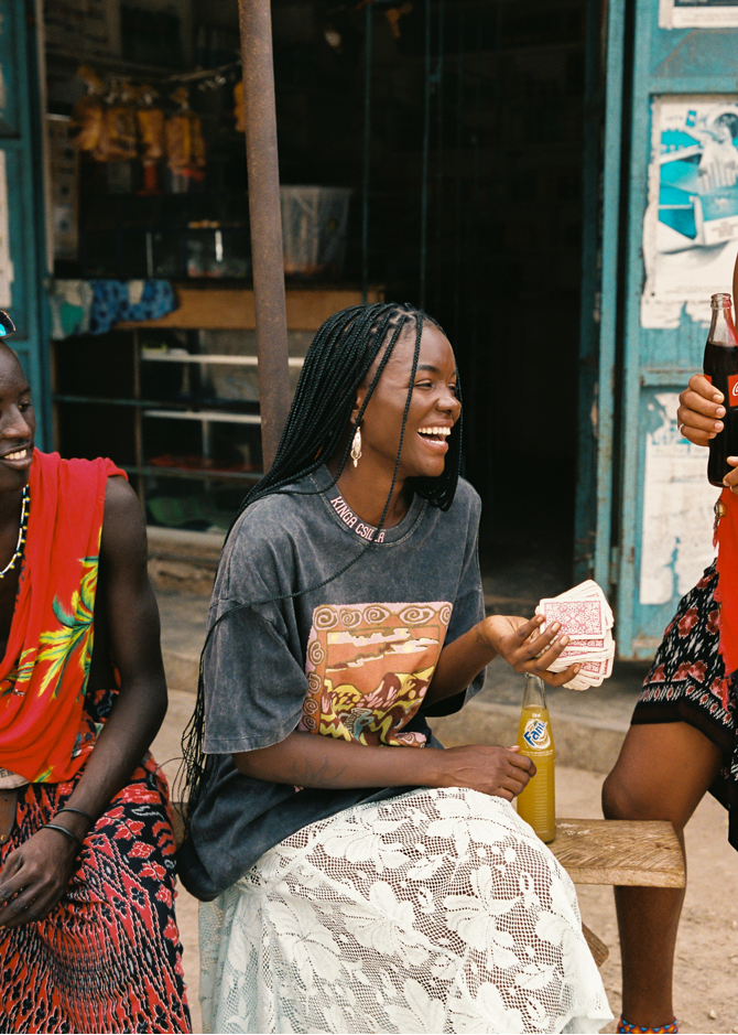 Woman in black t-shirt with graphic desert print