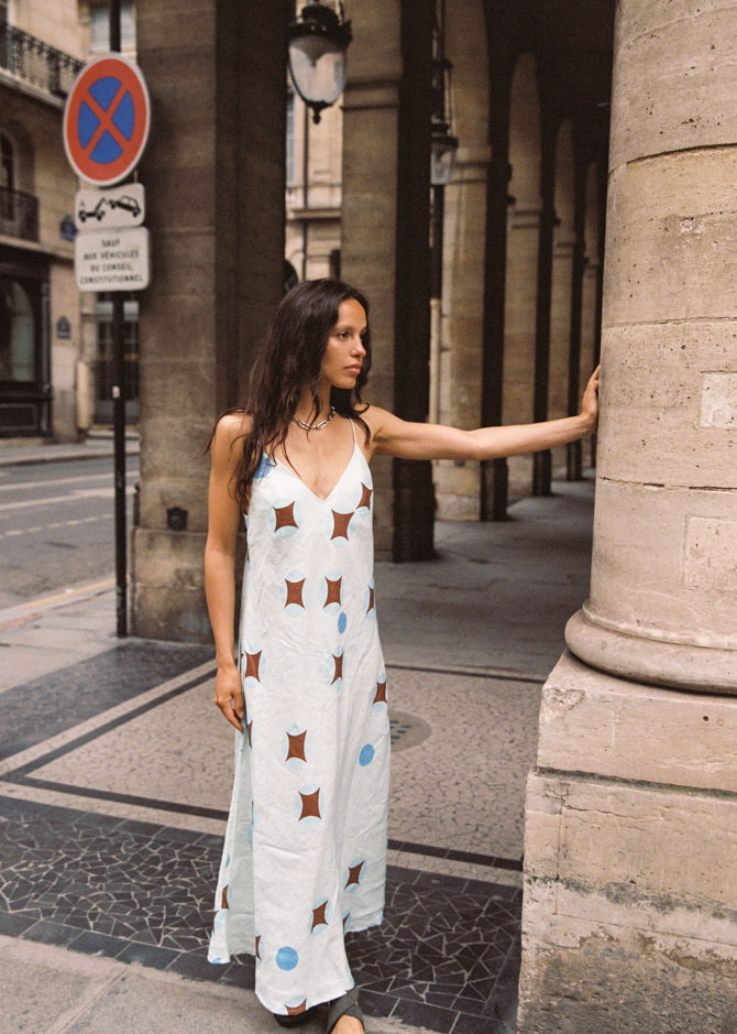 Kinga Csilla Aquarius Sia slip dress styled street look in baby blue linen with celestial print
