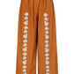 Kinga Csilla Bello Swirl Jessi Pant in earthy orange with white swirl embroidery, wide-leg silhouette and elastic waistband.