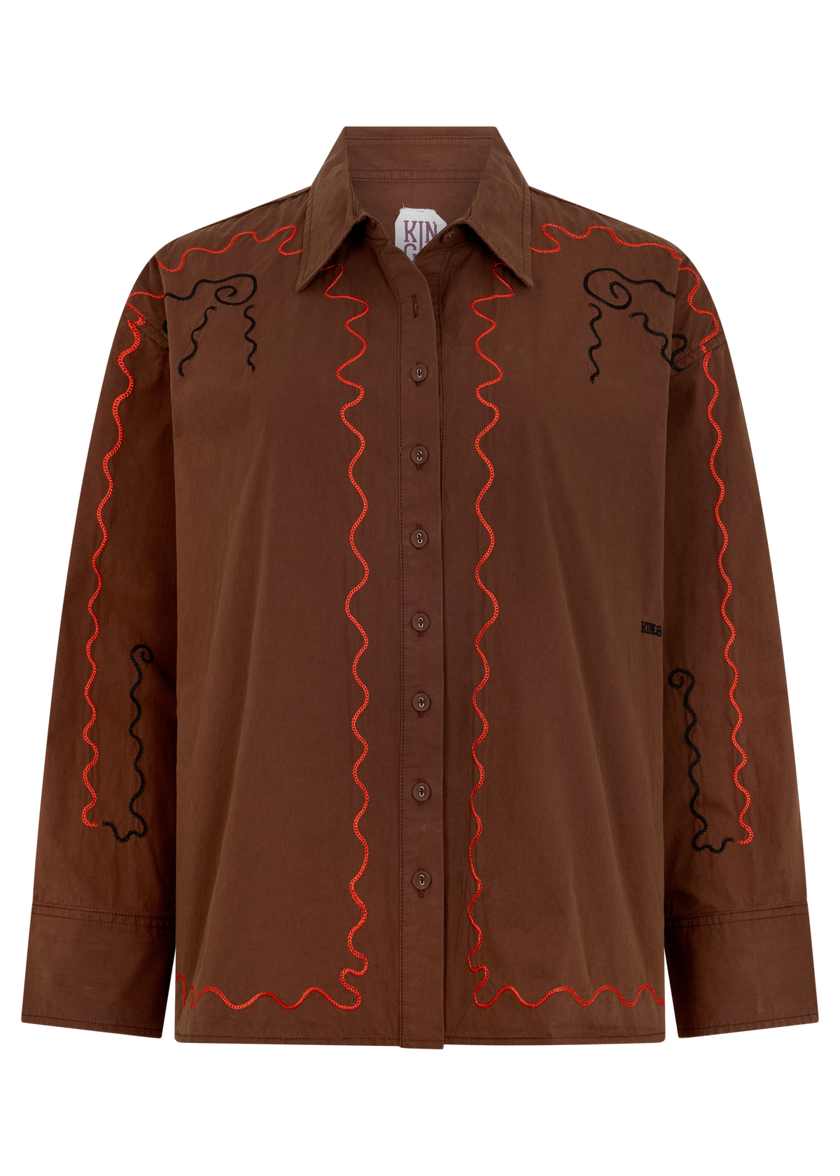 A brown long-sleeve button-up shirt with orange and black wavy line embroidery on the front and shoulders, displayed on a clean white background.