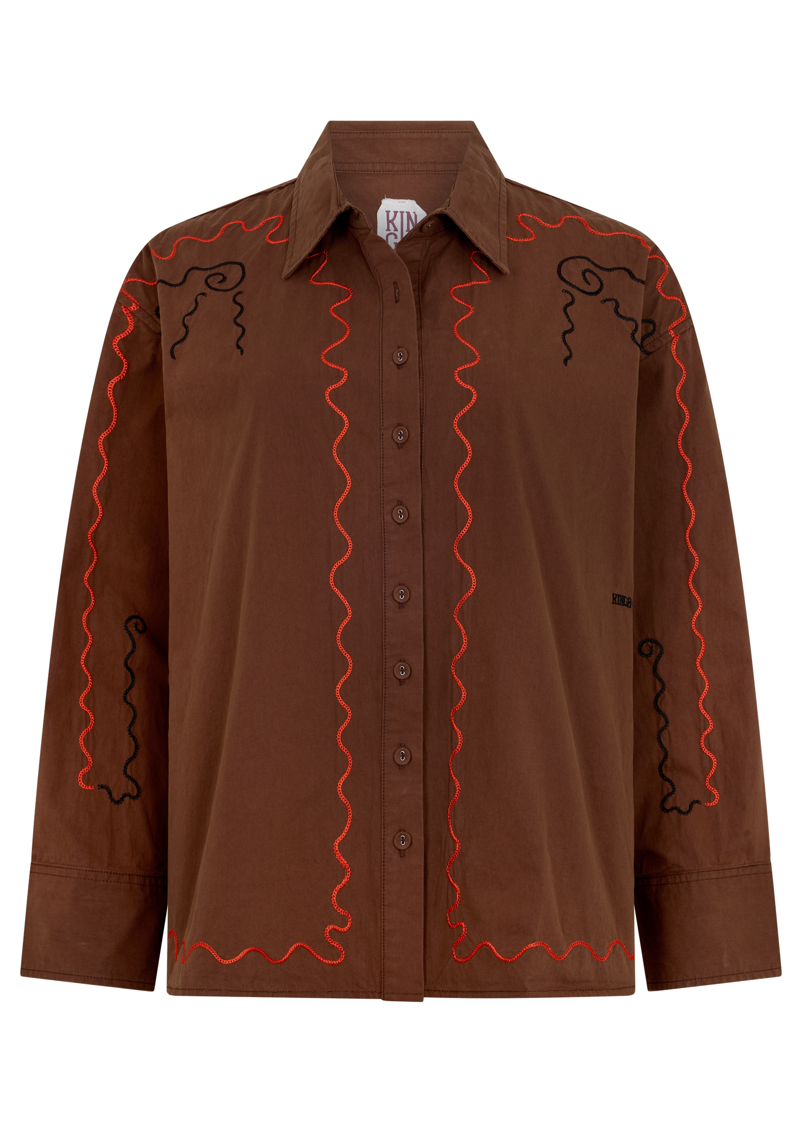 A brown long-sleeve button-up shirt with orange and black wavy line embroidery on the front and shoulders, displayed on a clean white background.