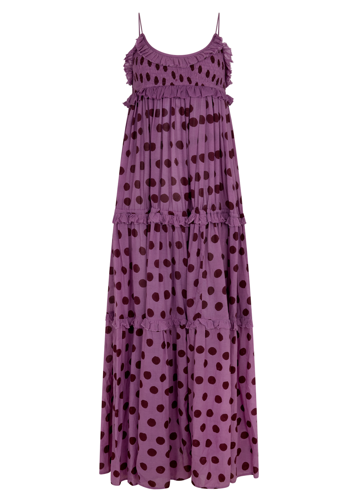 A tiered maxi dress in a dusty purple color with dark brown polka dots, featuring thin spaghetti straps and ruffled trim along the neckline and between the tiers, shown against a plain white background.