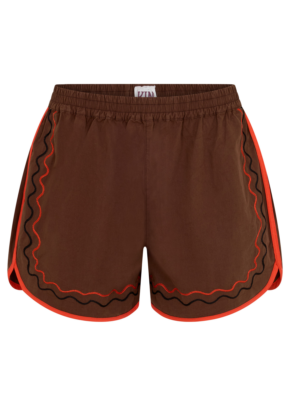 A pair of brown shorts featuring wavy black and orange embroidered trim along the side and hem edges, displayed against a solid white background.