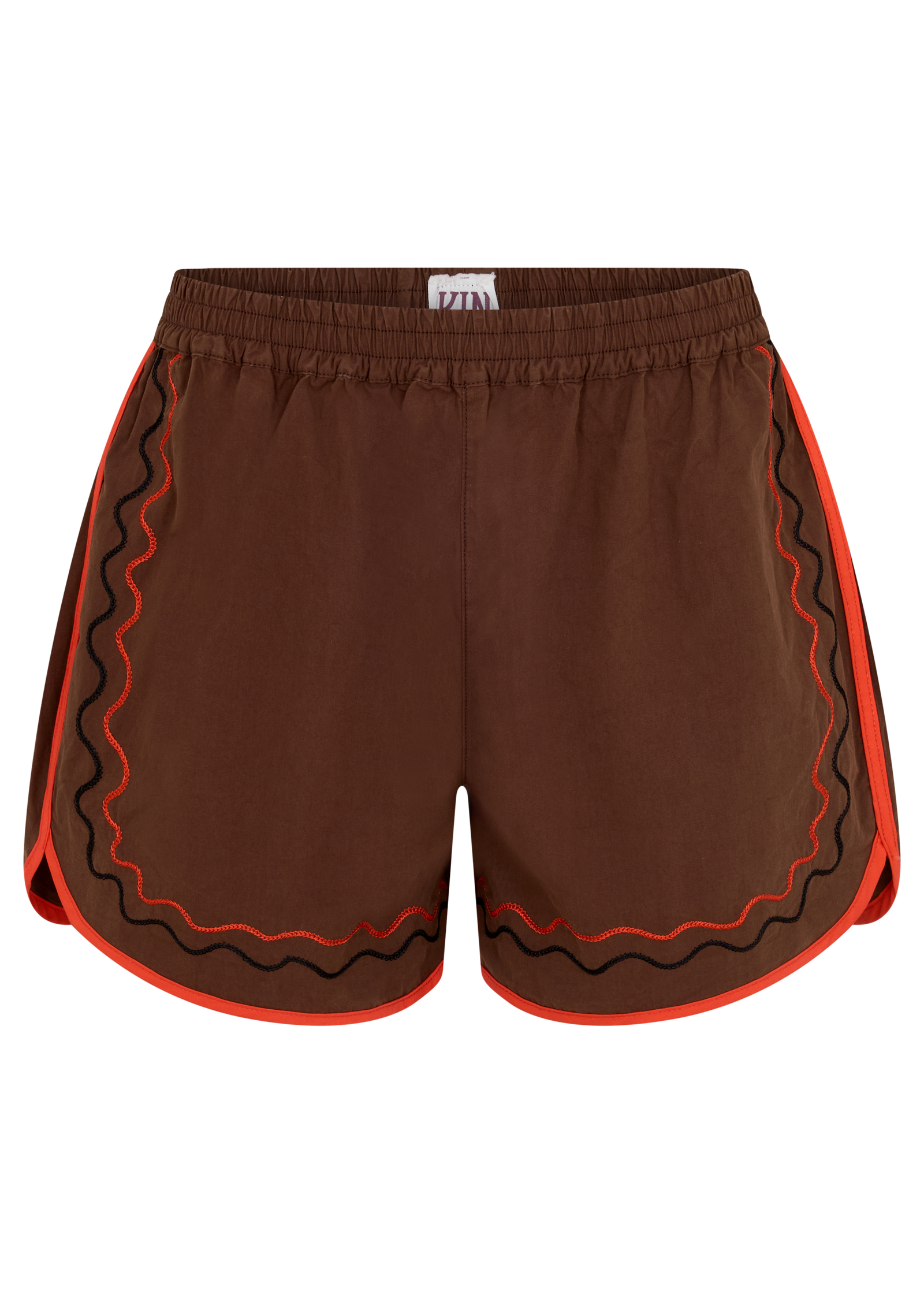 A pair of brown shorts featuring wavy black and orange embroidered trim along the side and hem edges, displayed against a solid white background.