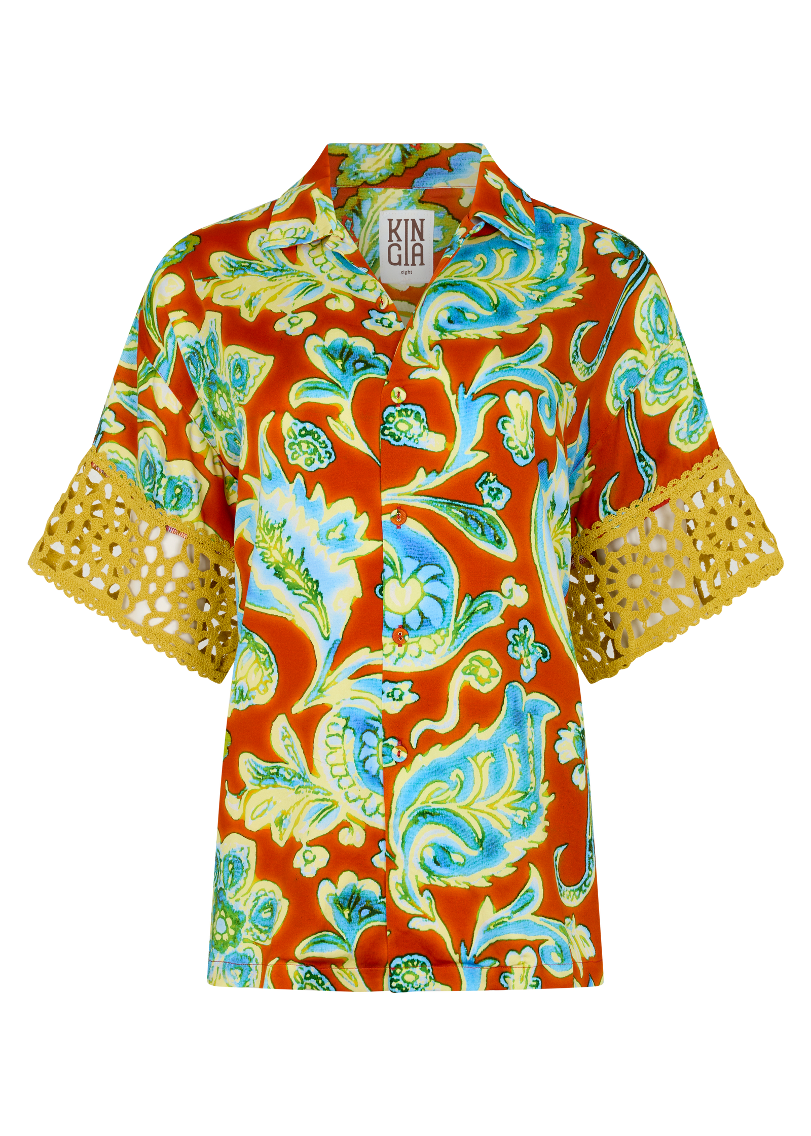 Woman wearing vibrant citrus orange, aqua and lime floral resort shirt with lime green crochet lace cuffs, slinky fabric, and relaxed oversized fit.