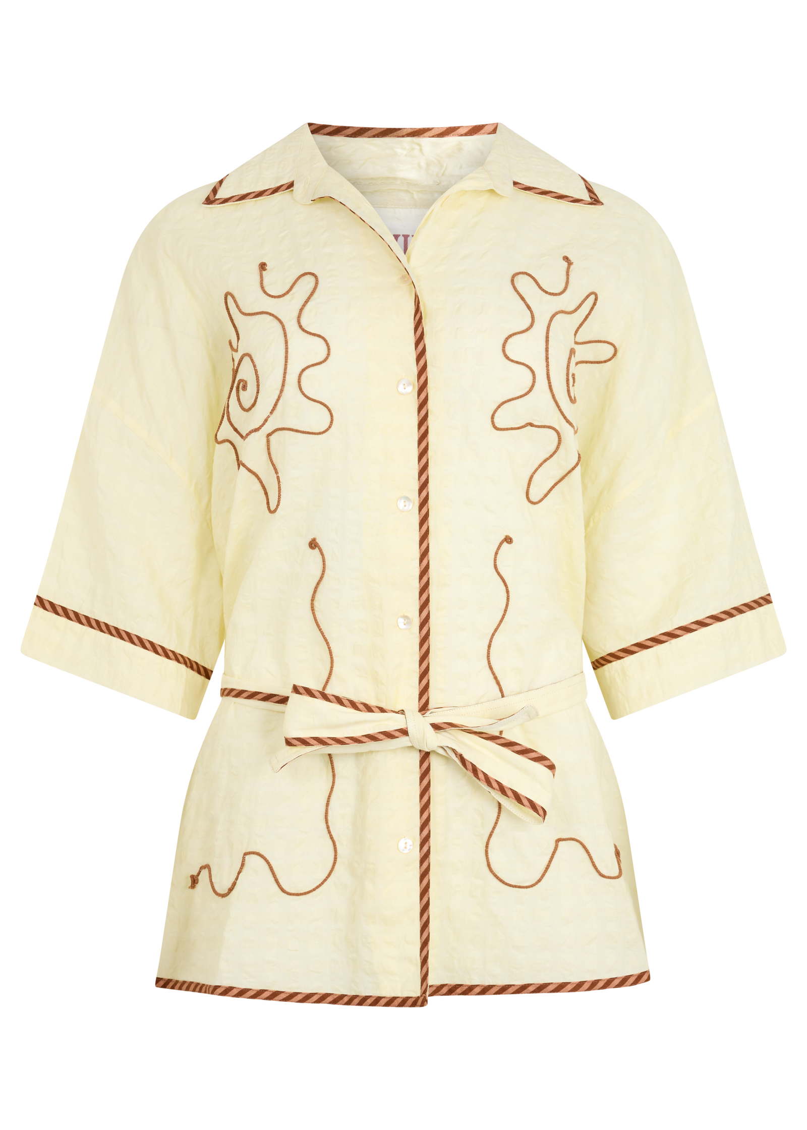 A kimono style cream shirt with brown embroidered details, displayed on a plain white background