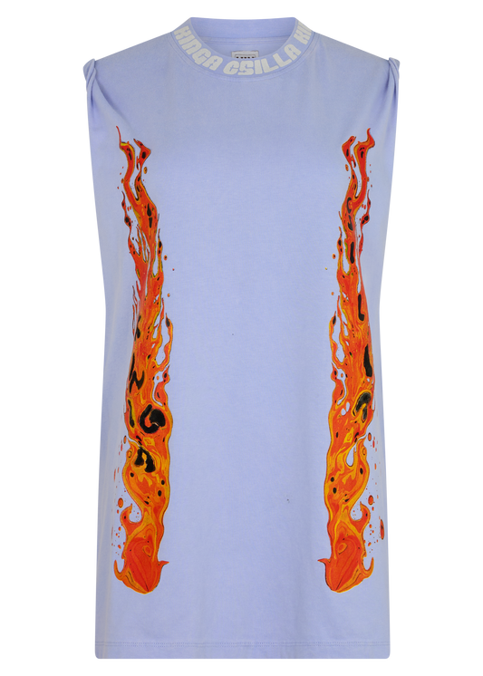 A periwinkle oversized tank top with orange flame details and white 'KINGA CSILLA' text on the neckline, displayed on a plain white background.