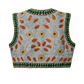 The back view of a sleeveless quilted vest featuring a light gray base with embroidered floral and leaf patterns in green, orange, and beige.