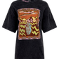 Black t-shirt with a colorful desert graphic design on a white background