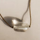 RADIATE CLEAR QUARTZ CHARM NECKLACE