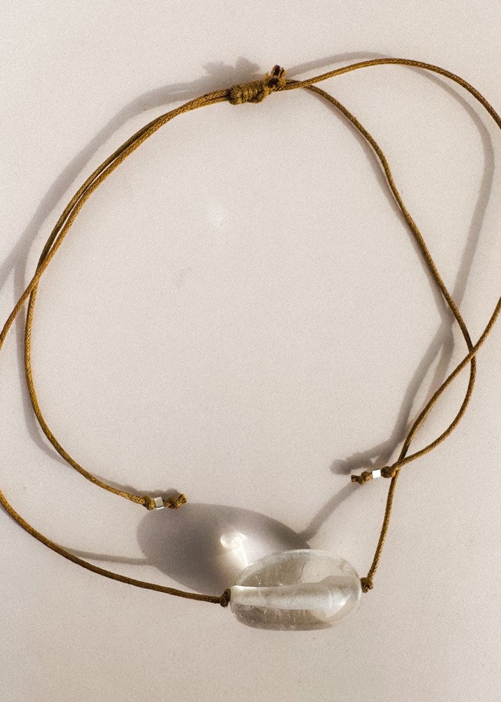 RADIATE CLEAR QUARTZ CHARM NECKLACE