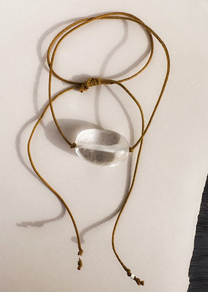 RADIATE CLEAR QUARTZ CHARM NECKLACE